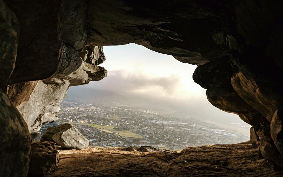 Looking out from a cave above Muizenberg, Cape Town